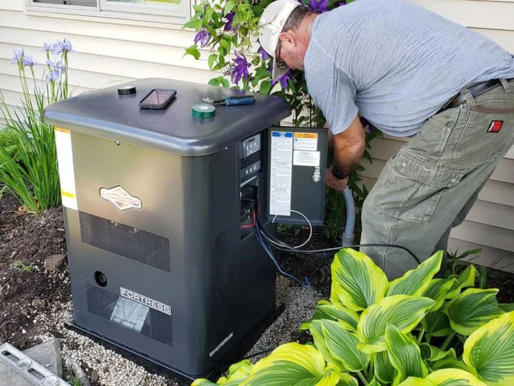 Powerhouse Generator -a man working on a generator